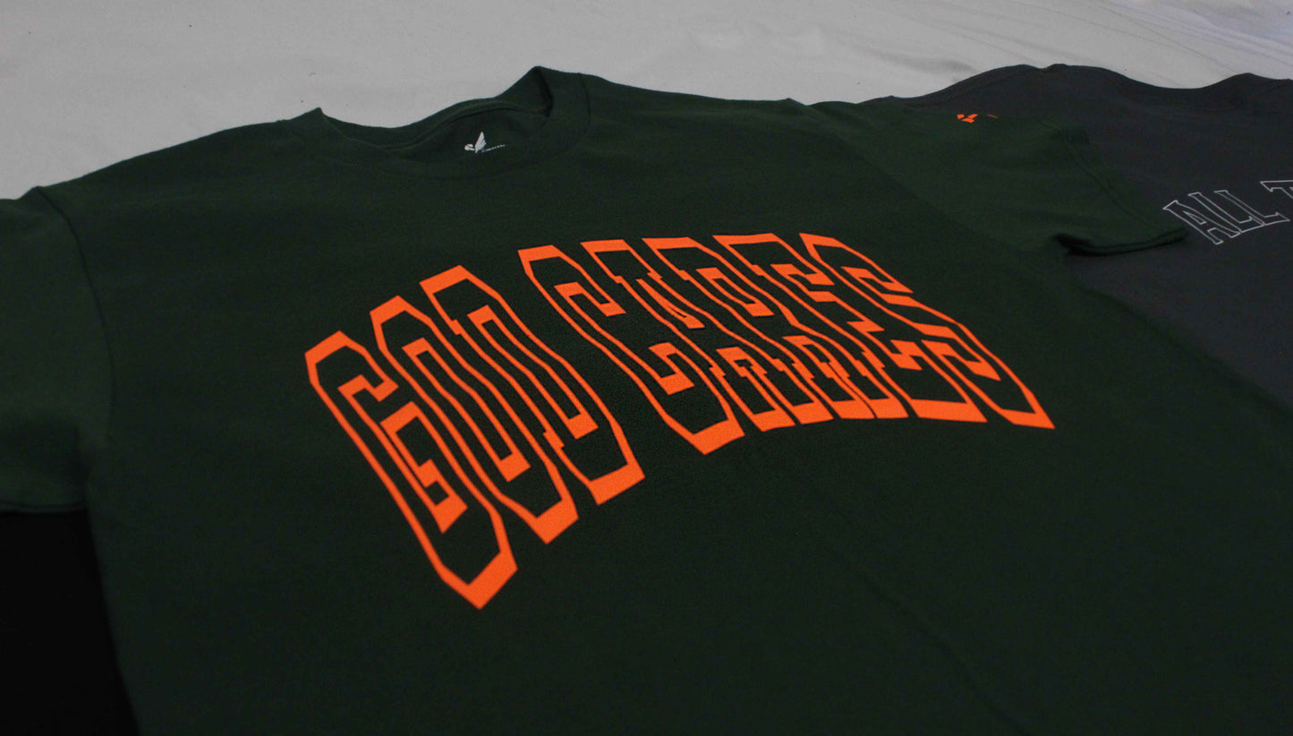 GC "God Cares" Glow-in-the-Dark Varsity Forest Green T-Shirt